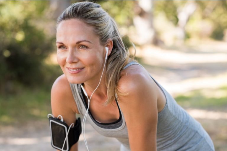 Portrait of athletic mature woman resting.