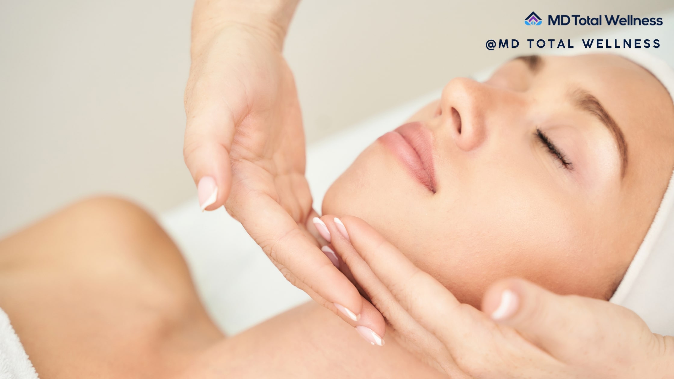 The Difference Between a Wellness Center and a MedSpa: What OC Patients Should Know 2 Woman in medspa vs wellness clinic with closed eyes receives gentle facial massage treatment from therapist's hands in a spa setting
